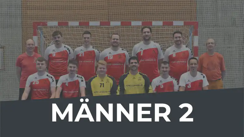 Group photo of a men's handball team posing in front of a goal, wearing red-and-white jerseys, two goalkeepers in yellow, with a 'MÄNNER 2' banner across the foreground.